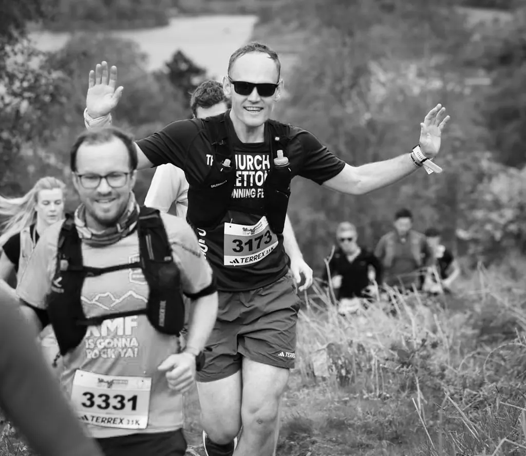 Andrew Brady running a trail race